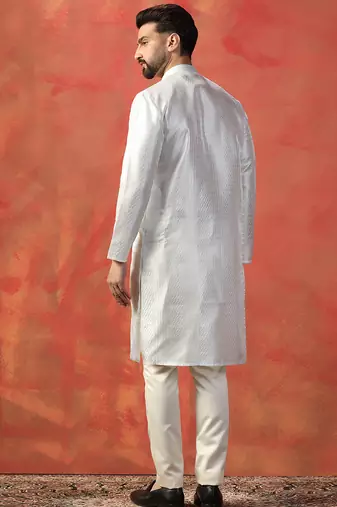 White embroidered kurta pant set     sophisticated indian traditional wear