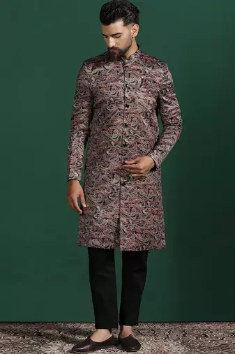 Maroon sherwani trouser set with paisley design     regal indian wedding attire