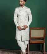 Cream sherwani dhoti set with paisley design     subtle indian groom outfit