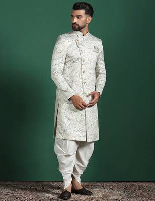 Cream sherwani dhoti set with paisley design     subtle indian groom outfit 3