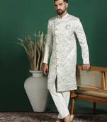 Cream sherwani pyjama set with paisley design     indian traditional wedding wear