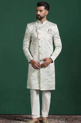 Cream sherwani pyjama set with paisley design