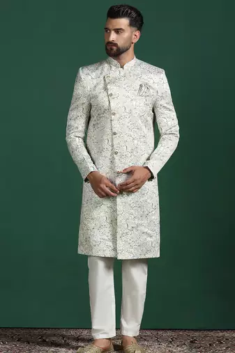 Cream sherwani pyjama set with paisley design