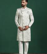 Cream sherwani pyjama set with paisley design