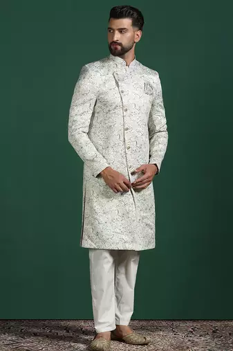 Cream sherwani pyjama set with paisley design