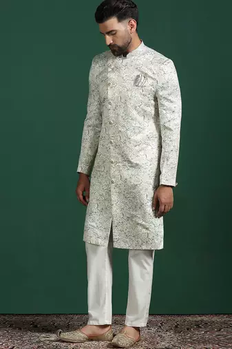 Cream sherwani pyjama set with paisley design