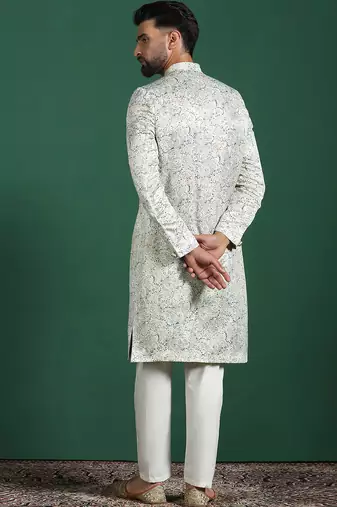 Cream sherwani pyjama set with paisley design