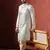 Cream sherwani patiala set with paisley design     indian cultural event outfit