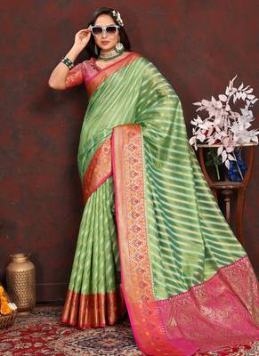 Green meenakari weaving work organza festival wear saree with blouse piece 1