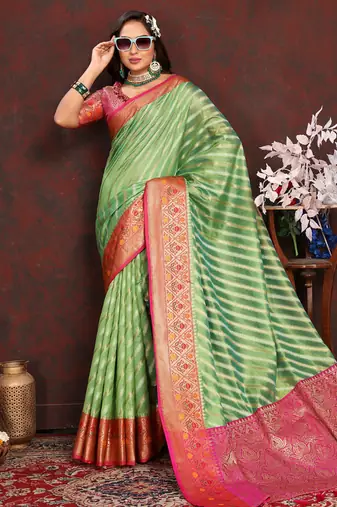 Green meenakari weaving work organza festival wear saree with blouse piece