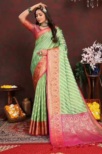 Green meenakari weaving work organza festival wear saree with blouse piece