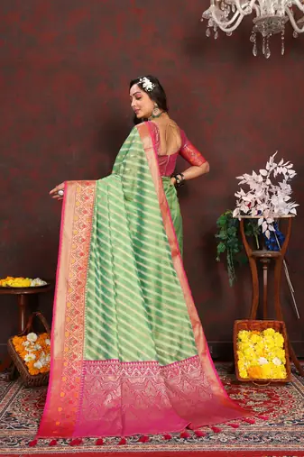 Green meenakari weaving work organza festival wear saree with blouse piece