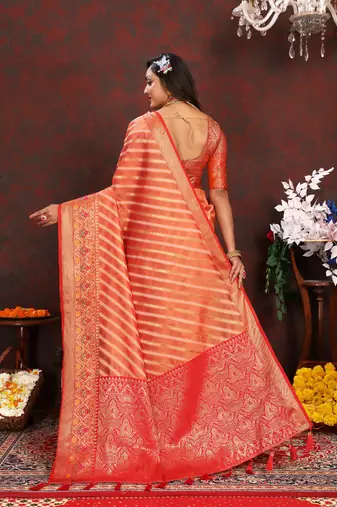 Orange meenakari weaving work organza festival wear saree with blouse piece