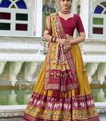 mustard Tussar Silk Patola Print Lehenga Choli with Foil Work Detailing