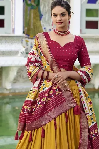 mustard Tussar Silk Patola Print Lehenga Choli with Foil Work Detailing