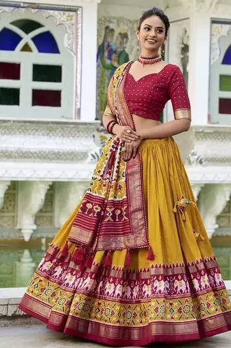 mustard Tussar Silk Patola Print Lehenga Choli with Foil Work Detailing