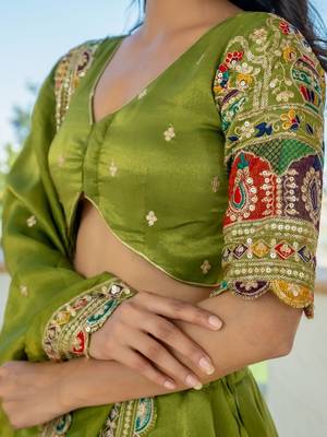 green thread embroidered silk mehendi lehenga set choli with dupatta 7