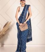 Blue linen zari printed saree with blouse.