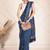 Blue linen zari printed saree with blouse.