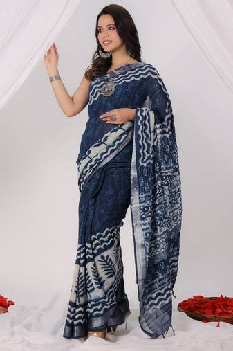 Blue linen zari saree with blouse.