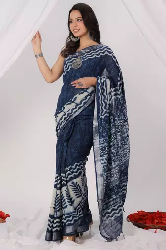 Blue linen zari saree with blouse.
