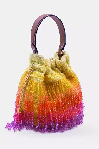 Handcrafted yellow ombre potli bag with crystal fringes and drawstring closer