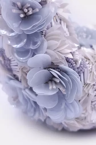 Embroidered white and blue floral sequins embellished clutch bag