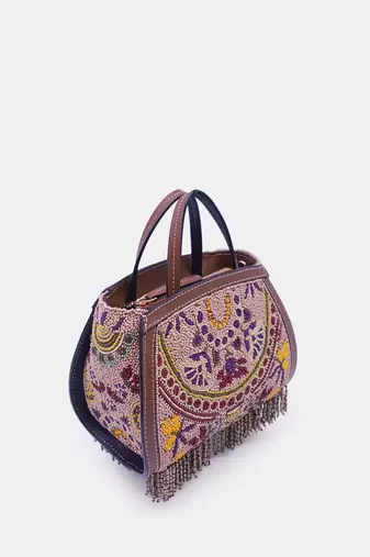 Purple clutch bag embellished with multi-floral beads