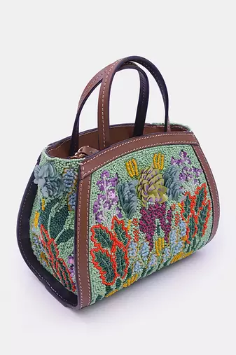 Green hand-embroidered clutch bag with bead embellished and a crossbody strap