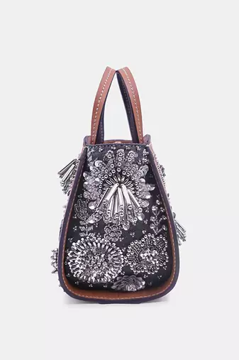 Silver embroidered bead-embellished clutch bag with crossbody strap.