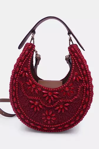 Maroon color embellished clutch bag