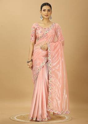 peach twill net saree with embroidery less and blouse 1