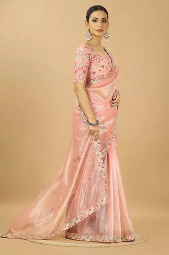 peach twill net saree with embroidery less and blouse