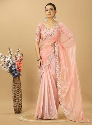 peach twill net saree with embroidery less and blouse 4