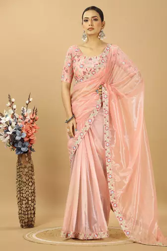 peach twill net saree with embroidery less and blouse