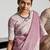 Elegant mauve woven linen saree with contrast zari border & tassels – soft & breathable party wear