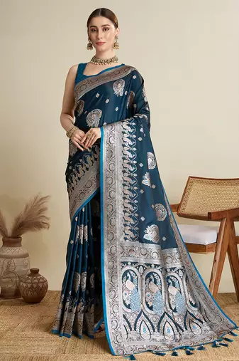 Blue satin soft silk blend saree with dark zari border and all over woven motifs