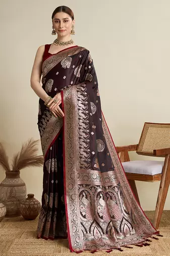 Maroon satin soft silk blend saree with dark zari border and all over woven motifs