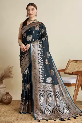 Teal satin soft silk blend saree with dark zari border and all over woven motifs