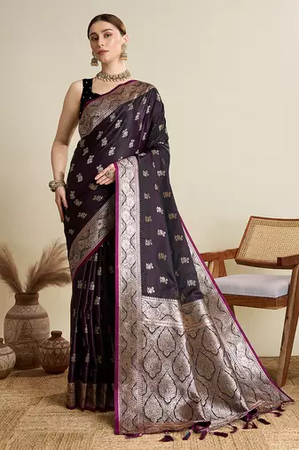 Magenta satin soft silk blend saree with dark zari border and all over woven motifs