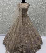 Beautiful Golden Net Sequins Bridal Wear Lehenga Choli With Dupatta
