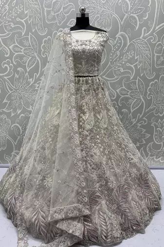 Dazzling White Multi-Thread Work Net Bridal Wear Lehenga Choli