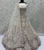 Dazzling White Multi-Thread Work Net Bridal Wear Lehenga Choli