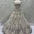 Dazzling White Multi-Thread Work Net Bridal Wear Lehenga Choli