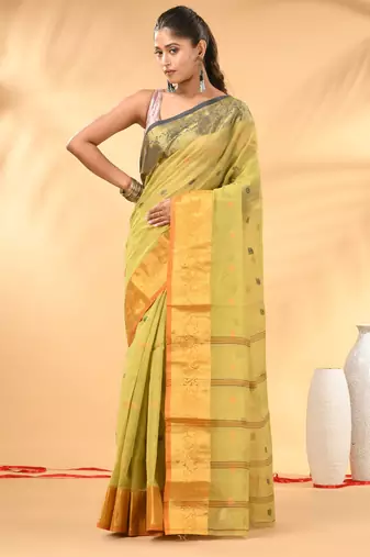 Pastel green tant pure cotton saree with contrasting zari border