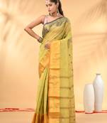 Pastel green tant pure cotton saree with contrasting zari border