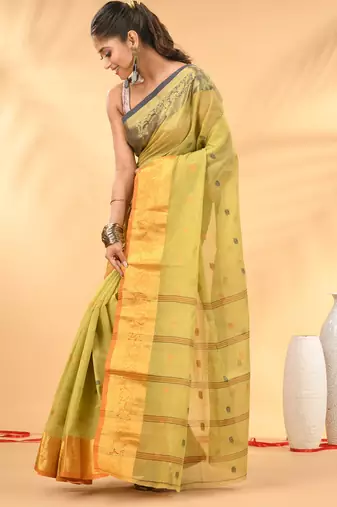Pastel green tant pure cotton saree with contrasting zari border