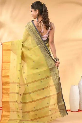 Pastel green tant pure cotton saree with contrasting zari border