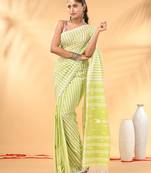 Lime green and white handwoven cotton saree with all-over stripes and textured pallu