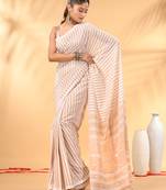Beige and white handwoven cotton saree with all-over stripes and textured pallu